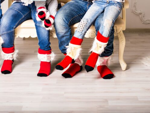 Family wearing holiday socks